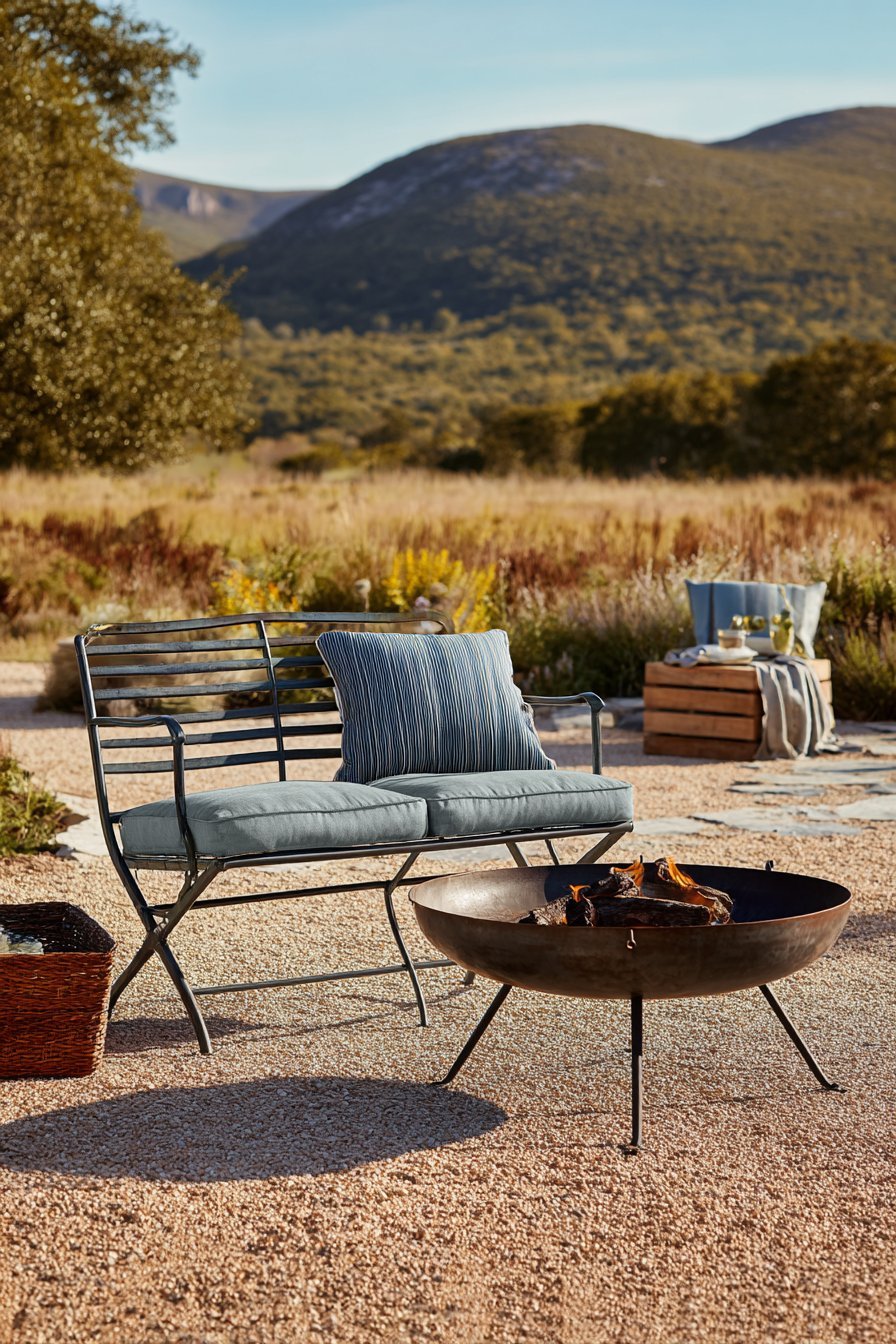Pea Gravel with Refinished Metal Furniture