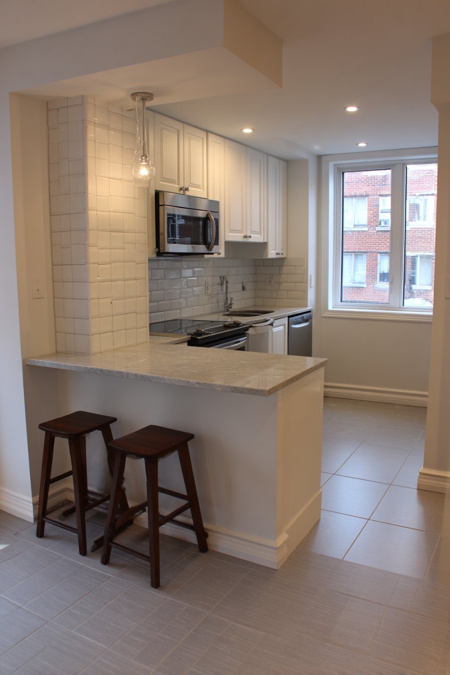 Peninsula Kitchen with Shaker-Style Cabinets