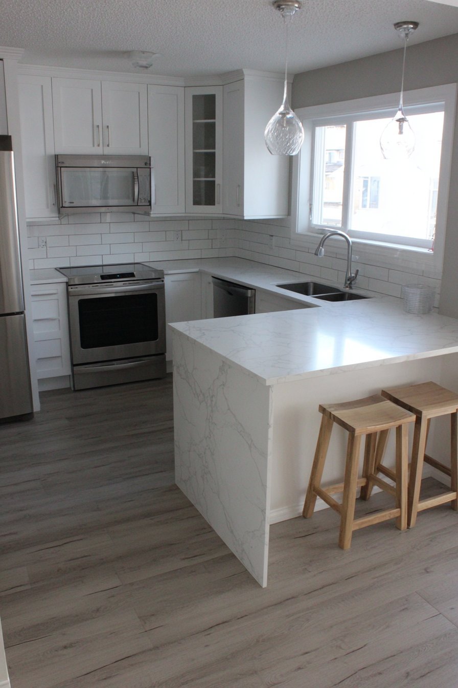 Peninsula Kitchen with Shaker-Style Cabinets