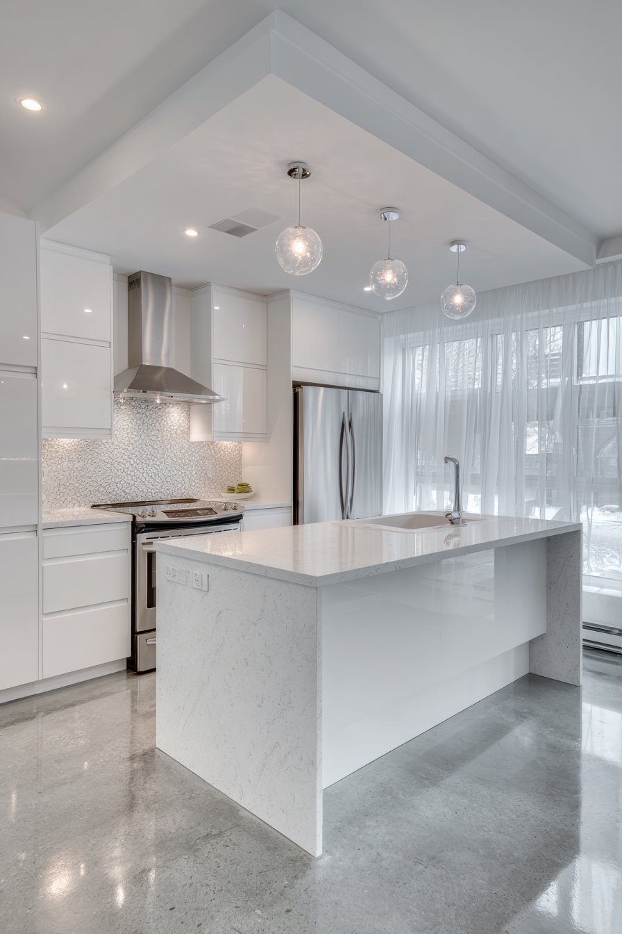 Monochromatic White Kitchen with Textured Elements