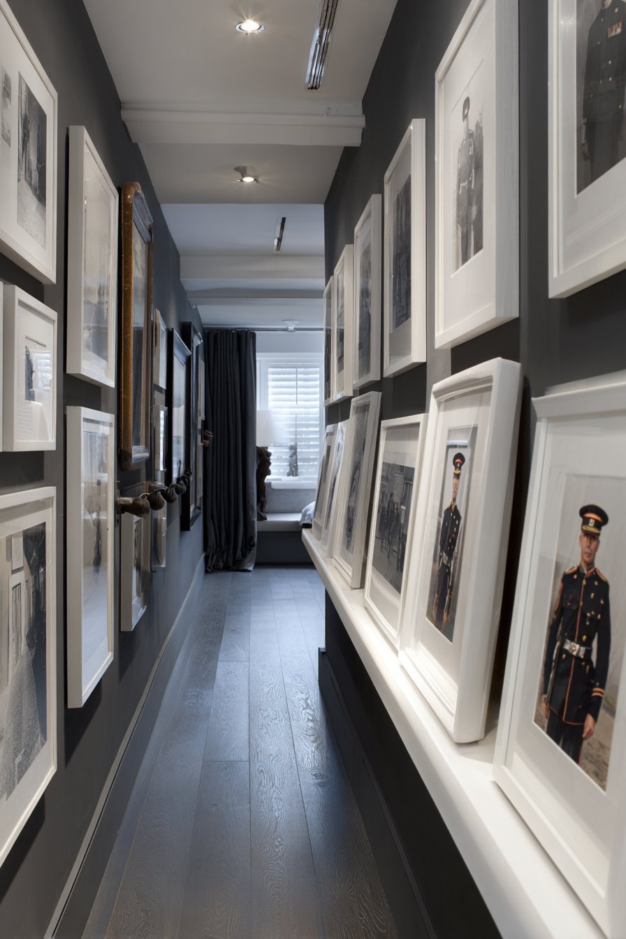 Vertical Column Gallery in Small Apartment Hallway