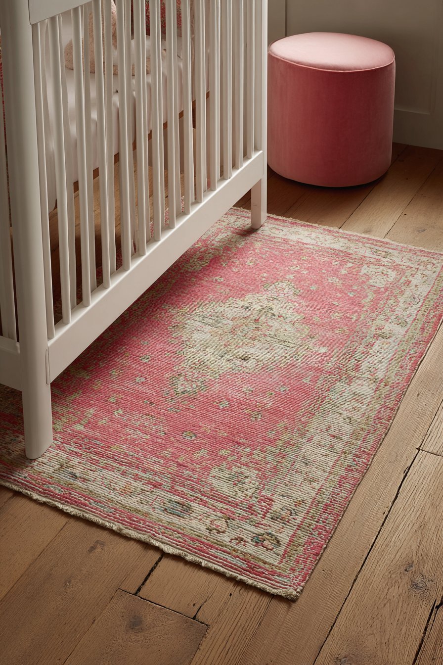 Worn Hardwood with Vintage Rug