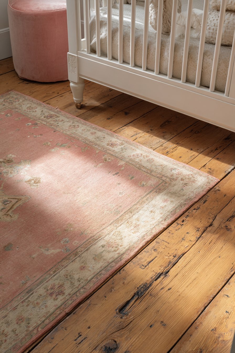 Worn Hardwood with Vintage Rug